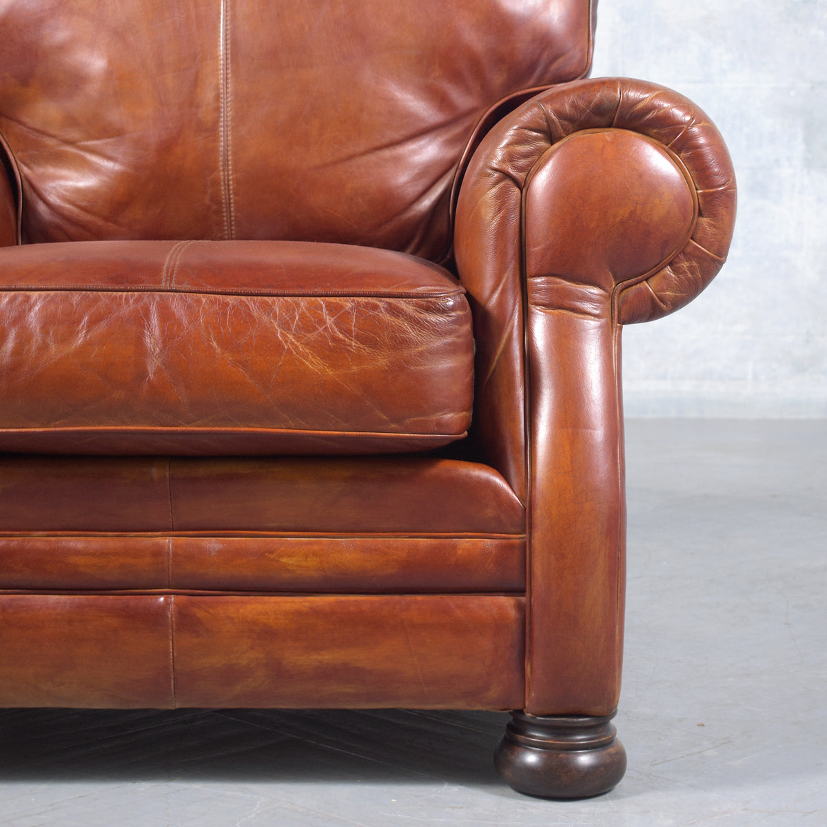 Restored Vintage Leather Armchairs: Rich Cognac Brown Elegance