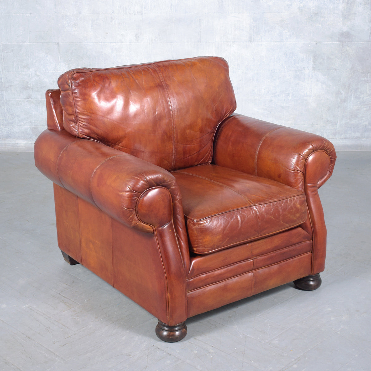 Restored Vintage Leather Armchairs: Rich Cognac Brown Elegance