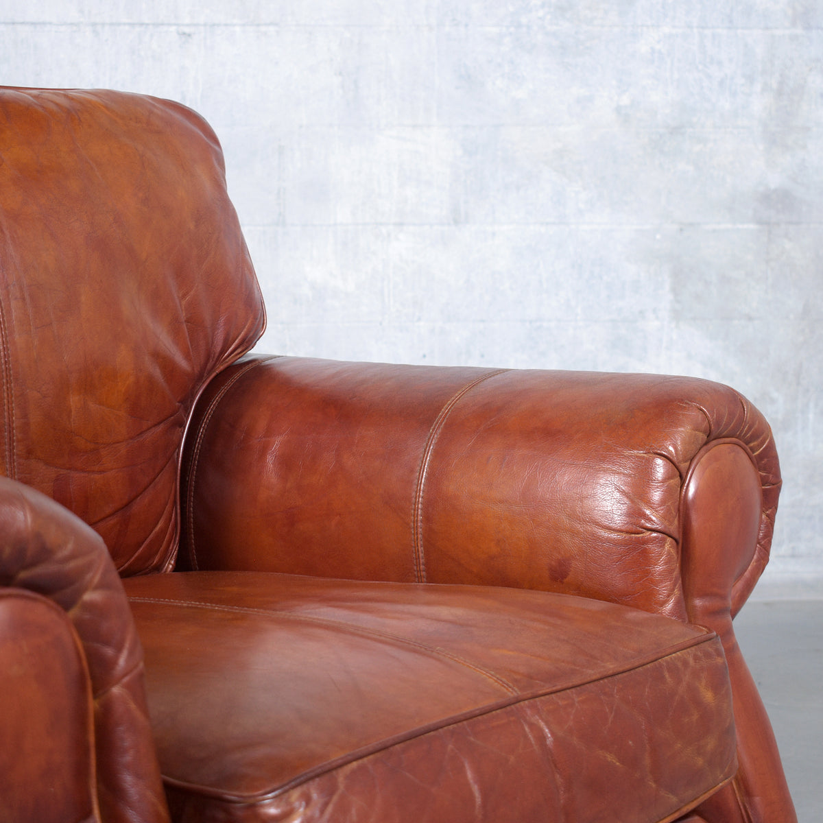 Restored Vintage Leather Armchairs: Rich Cognac Brown Elegance