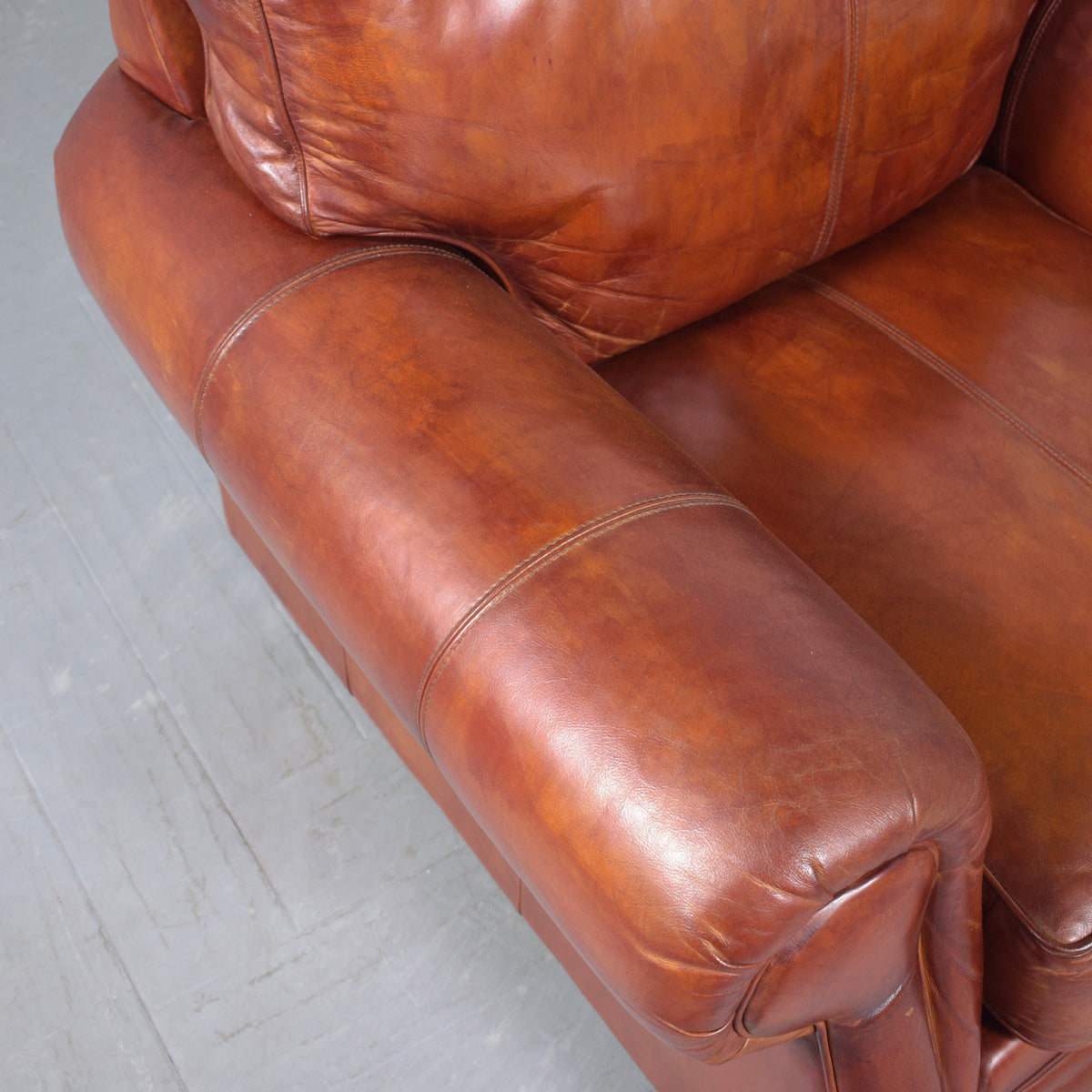 Restored Vintage Leather Armchairs: Rich Cognac Brown Elegance