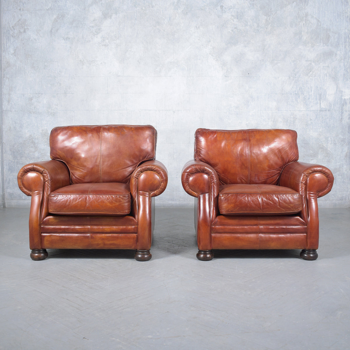 Restored Vintage Leather Armchairs: Rich Cognac Brown Elegance