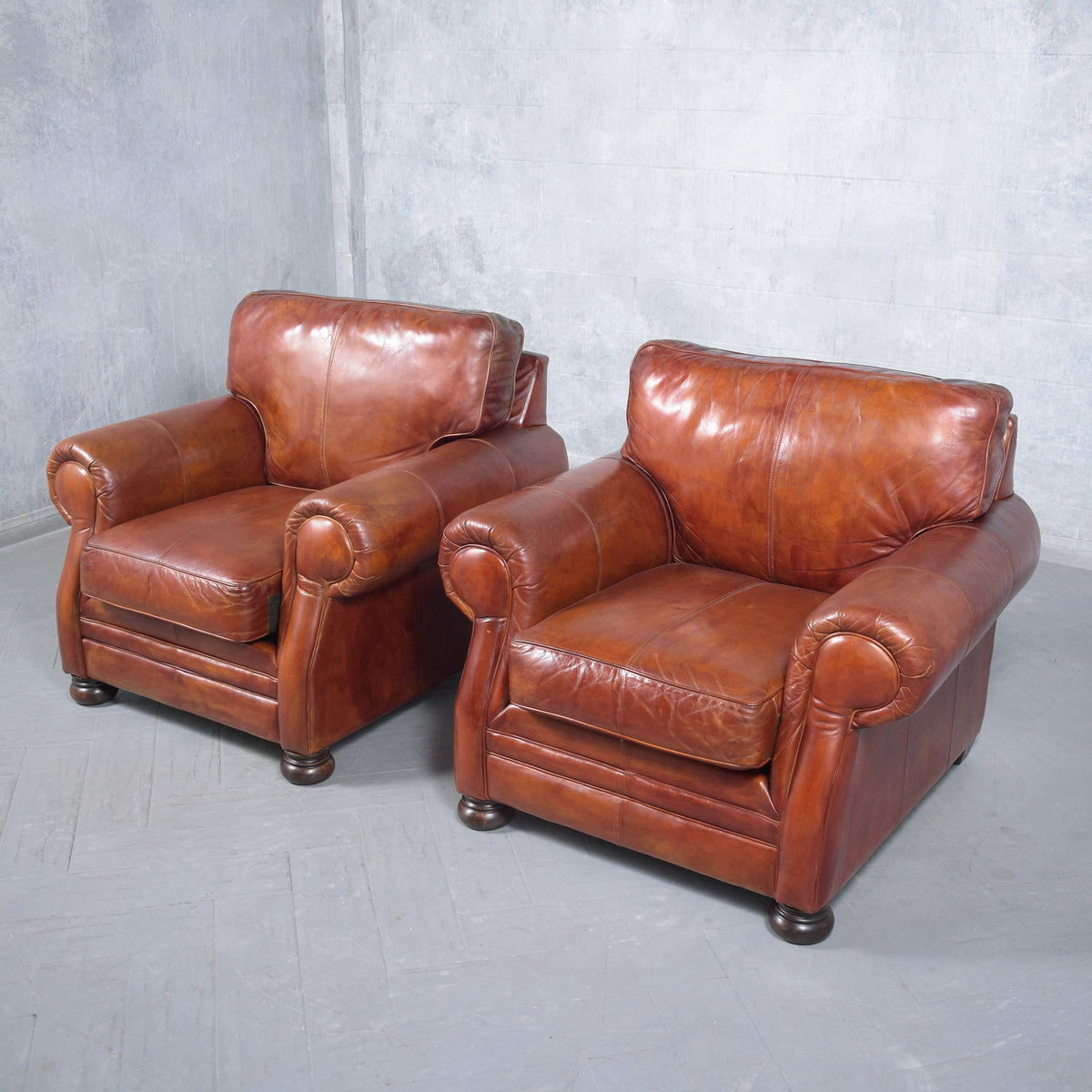 Restored Vintage Leather Armchairs: Rich Cognac Brown Elegance