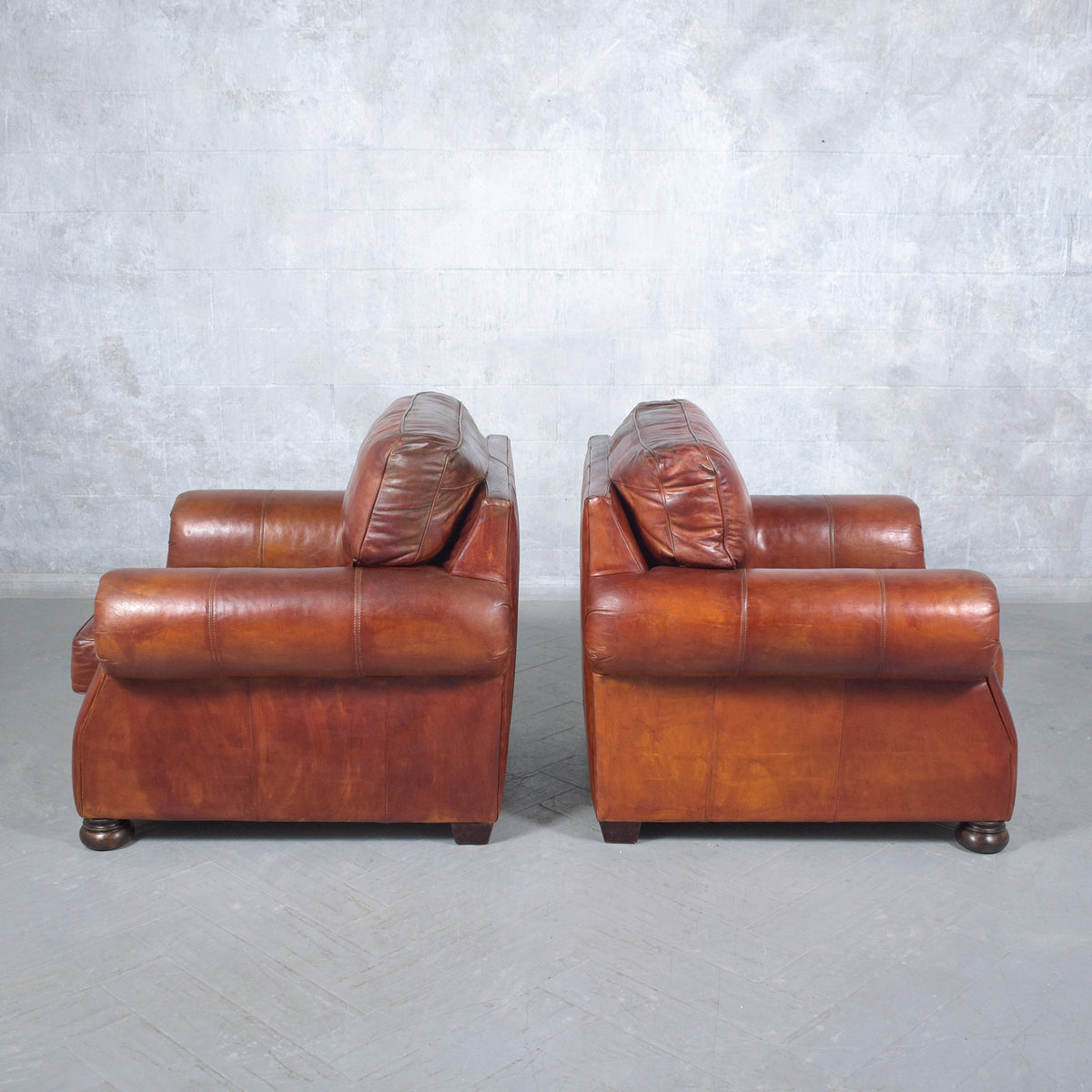 Restored Vintage Leather Armchairs: Rich Cognac Brown Elegance