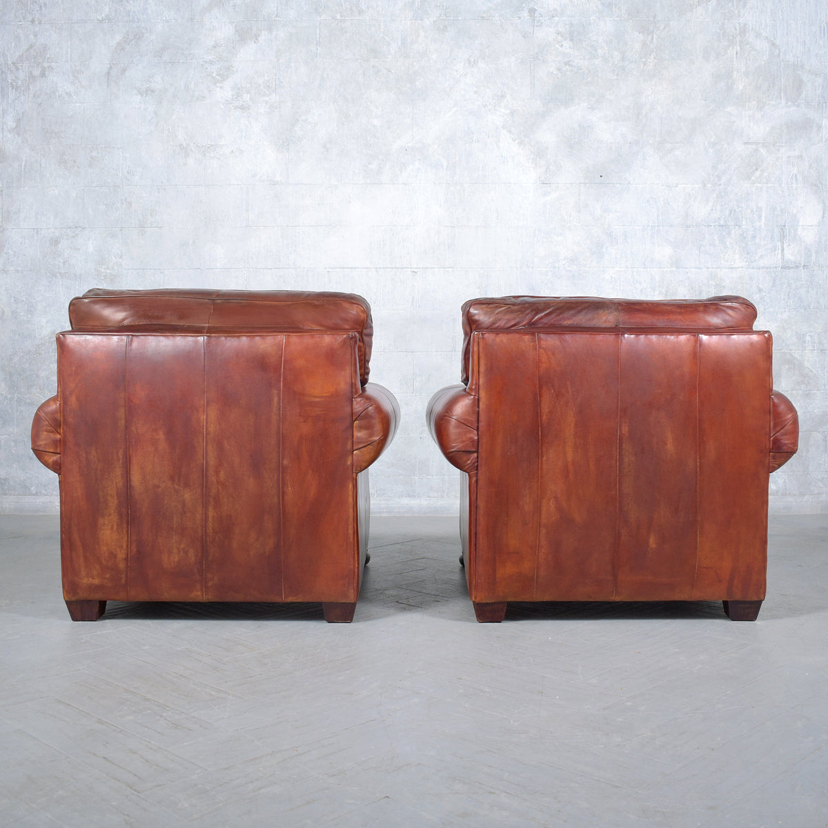 Restored Vintage Leather Armchairs: Rich Cognac Brown Elegance